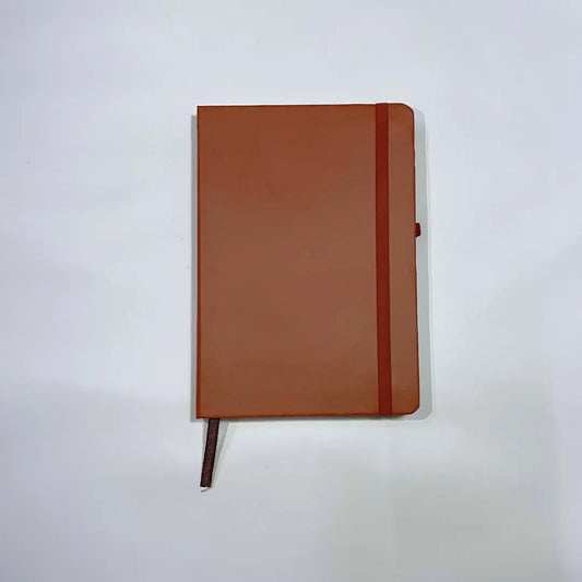 A5 hardbound notebook in tan with elastic band and pen loop 
